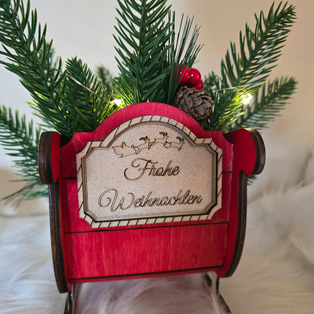 Weihnachtsschlitten aus Holz – mit Rentieren & Personalisierung