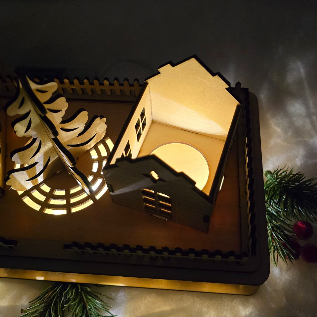 Winterzauber – Holzhaus-Deko mit Lichtpodest