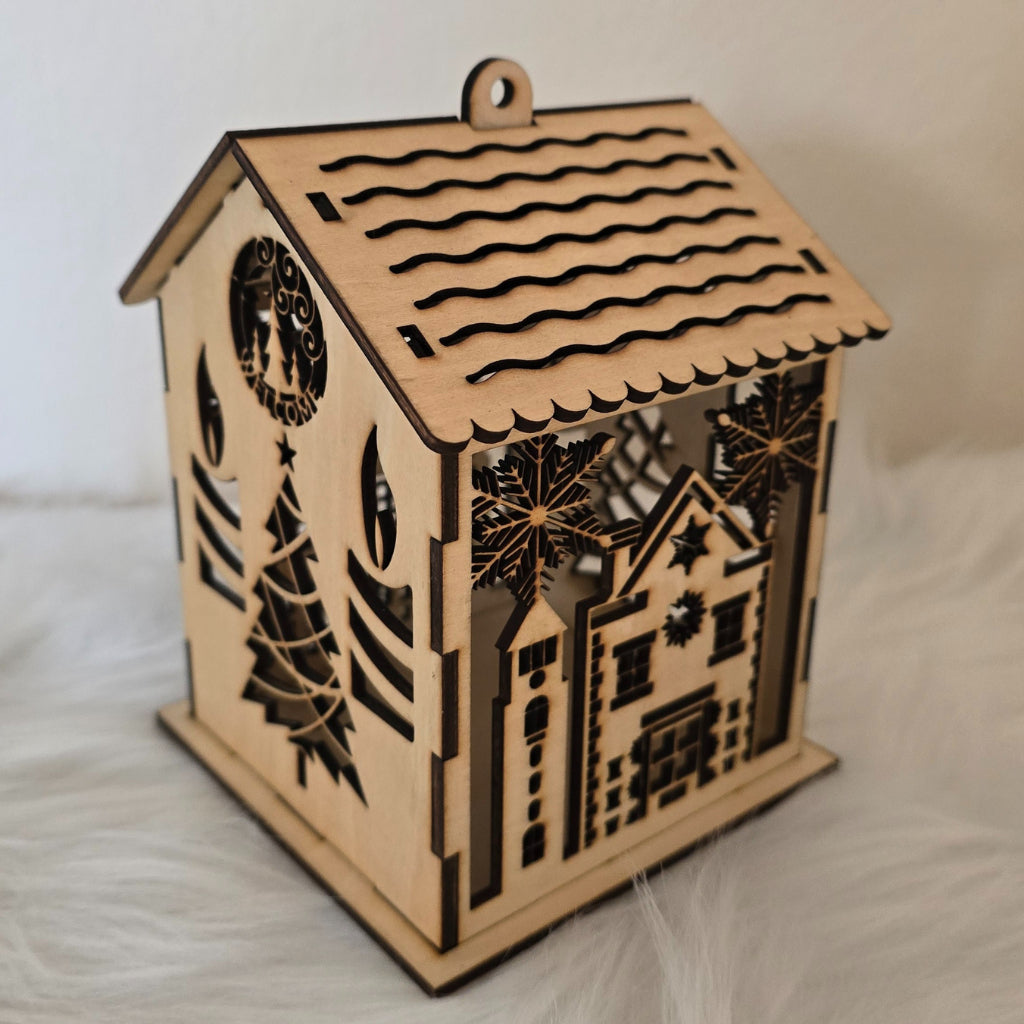 Holzhäuser mit Lichtspiel – Weihnachtsdeko aus Lindenholz